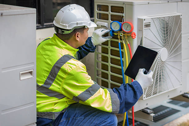 Professional Air Conditioning Repair technician working in Haw River, NC